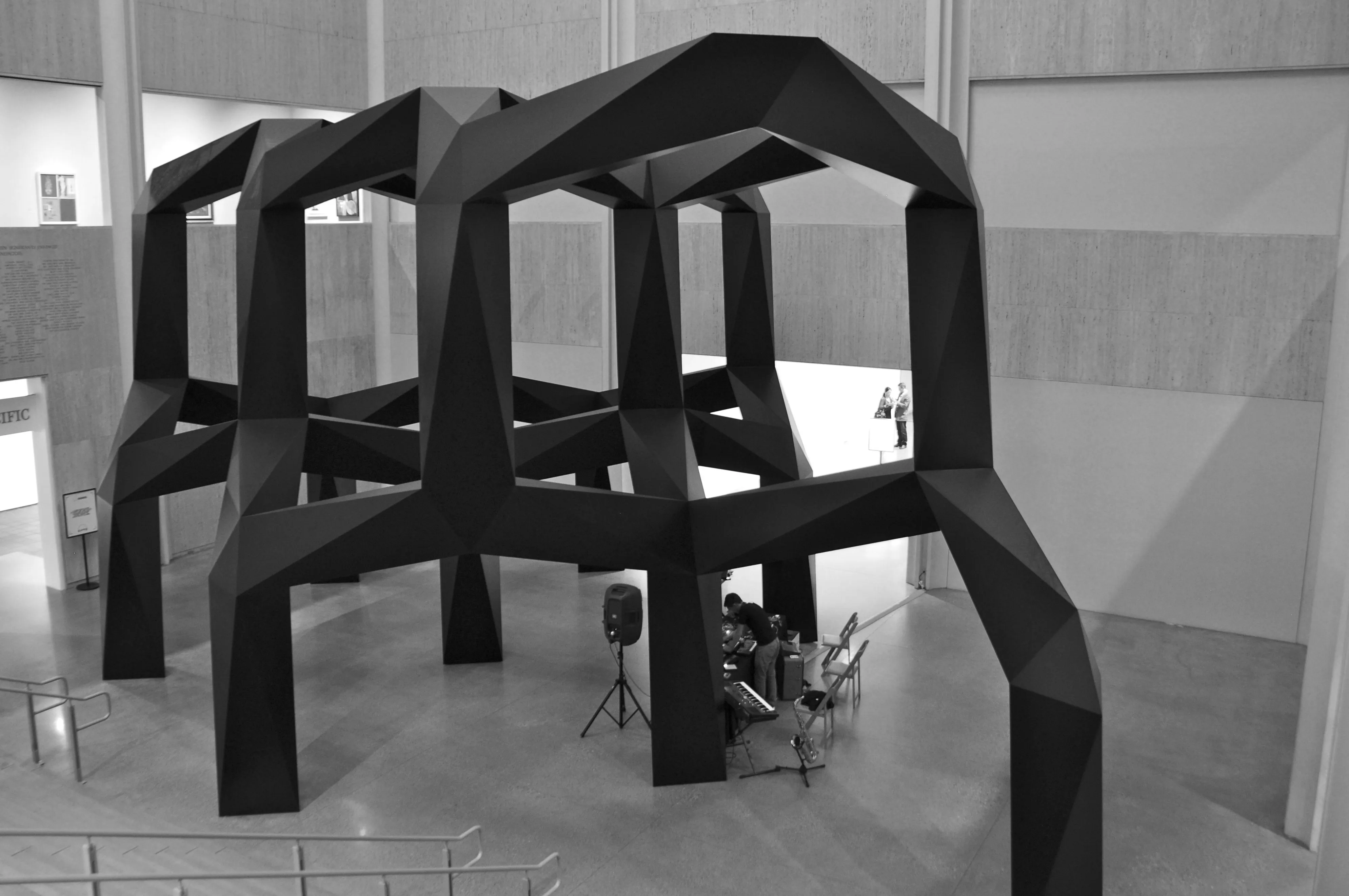 Performing beneath “Smoke” by Tony Smith